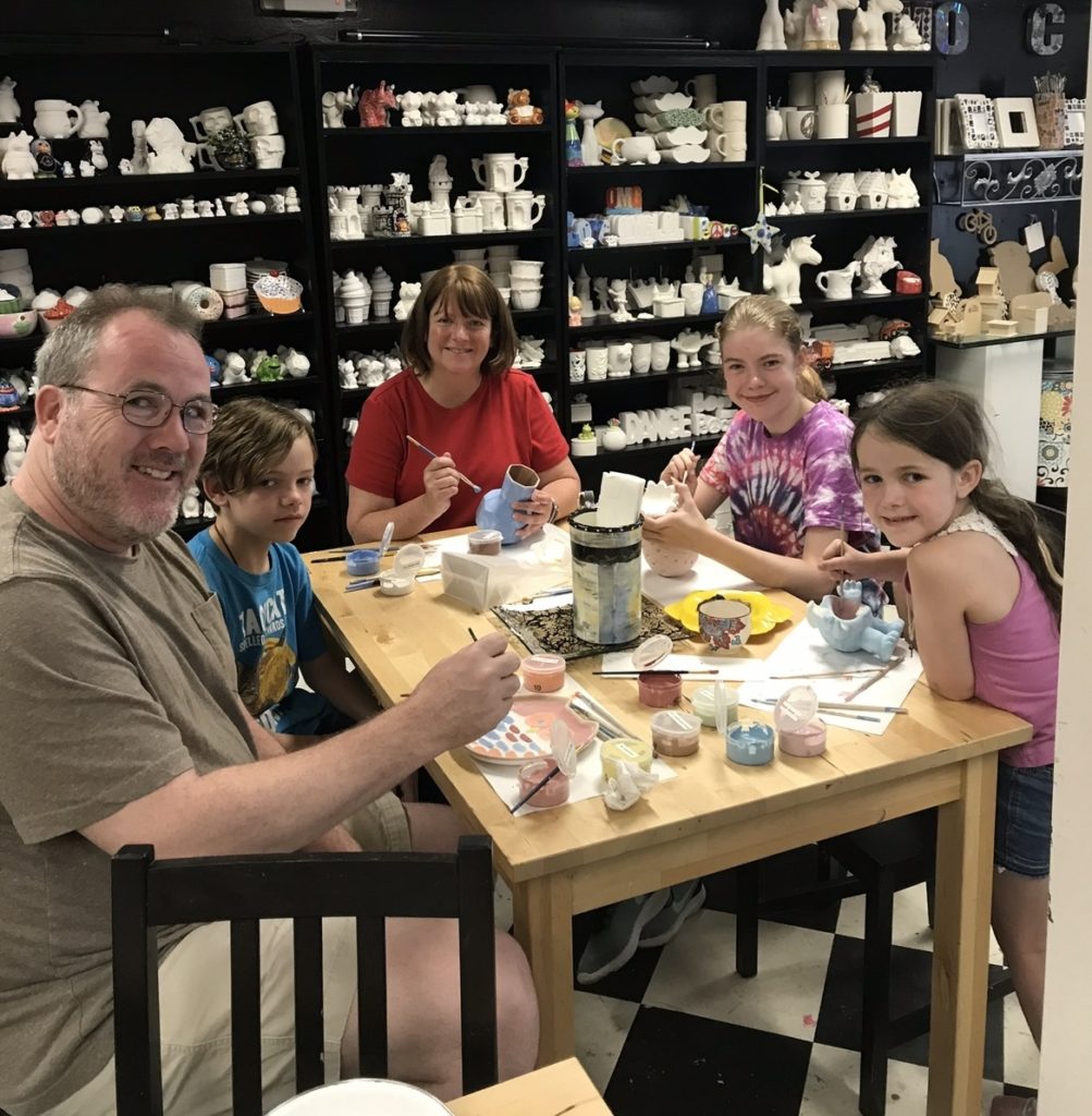 Kids engaging in a lively and imaginative after school art program at the Englewood NJ studio